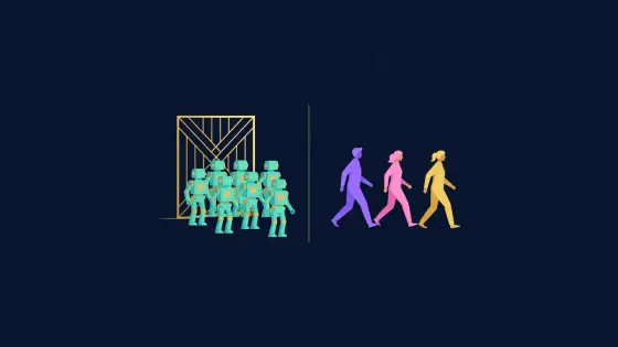 Robot figures stopped at a gate while people walk through another lane