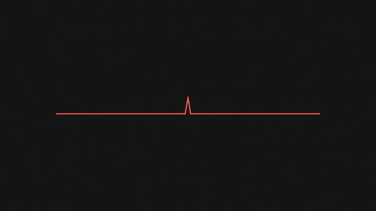 A flat line with one sharp vertical spike