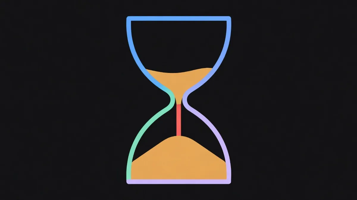 An hourglass with sand in the lower half